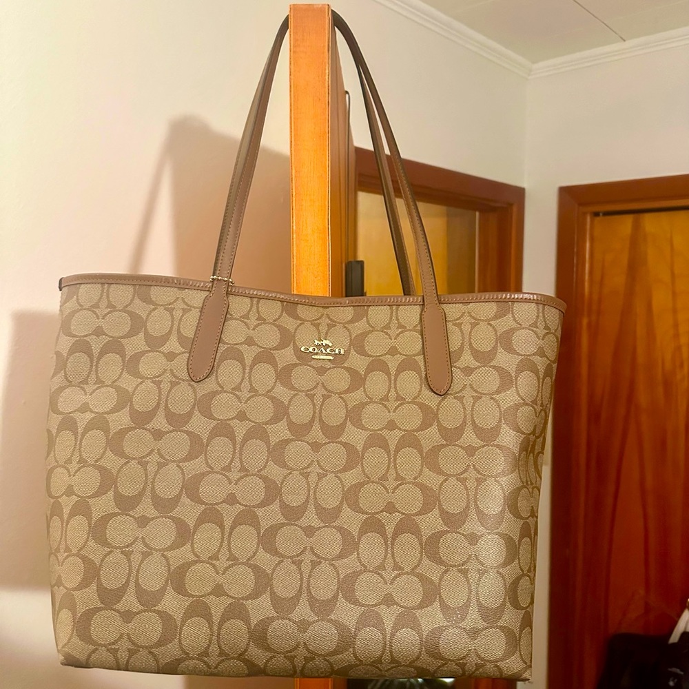 Coach signature canvas tote bag and matching Coach wallet